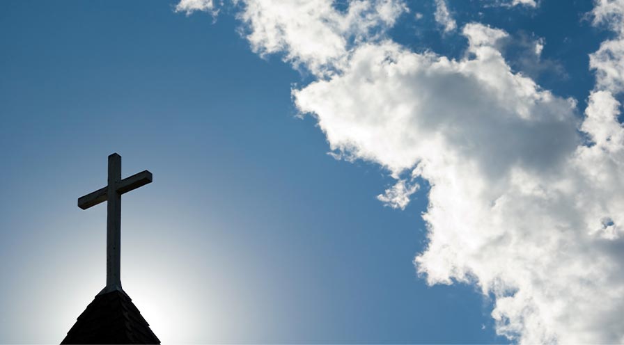 Cross in blue sky