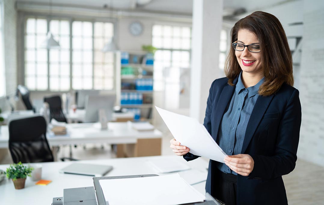 woman looking at fax